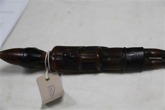 An early 20th century African carved wood walking stick, 37in.